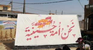 پرچم های عهدی که با اثر انگشت زائران حسینی جان می گیرند